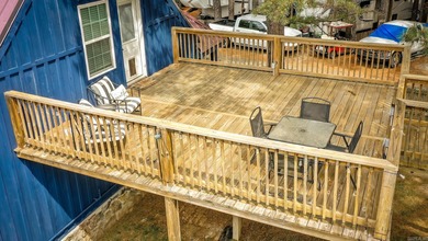 Brand New Exterior Paint completed April 2025! Adorable River on Riverland Country Club in Arkansas - for sale on GolfHomes.com, golf home, golf lot