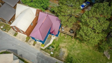 Brand New Exterior Paint completed April 2025! Adorable River on Riverland Country Club in Arkansas - for sale on GolfHomes.com, golf home, golf lot