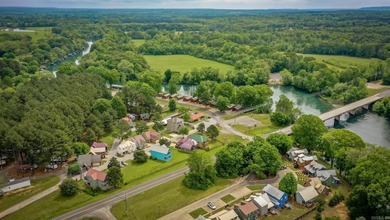 Brand New Exterior Paint completed April 2025! Adorable River on Riverland Country Club in Arkansas - for sale on GolfHomes.com, golf home, golf lot