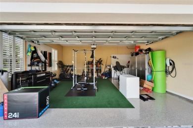 Country Club Waterfront Maintenance Free Living Everyday!  This on Grasslands Golf and Country Club in Florida - for sale on GolfHomes.com, golf home, golf lot