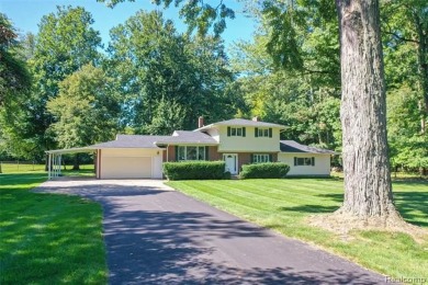 Take a look at this beautiful setting, it's only had one owner on IMA Brookwood Golf Course in Michigan - for sale on GolfHomes.com, golf home, golf lot