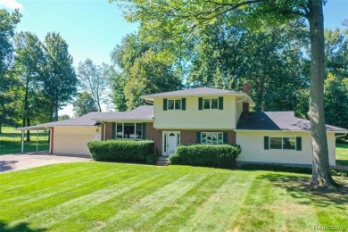 Take a look at this beautiful setting, it's only had one owner on IMA Brookwood Golf Course in Michigan - for sale on GolfHomes.com, golf home, golf lot