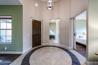 Welcome to this stunning energy-efficient 4-bedroom, 2.5-bath on Estrella Mountain Ranch Golf Course in Arizona - for sale on GolfHomes.com, golf home, golf lot