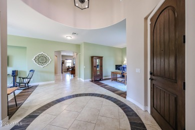 Welcome to this stunning energy-efficient 4-bedroom, 2.5-bath on Estrella Mountain Ranch Golf Course in Arizona - for sale on GolfHomes.com, golf home, golf lot