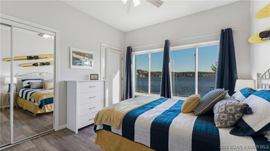 Enjoy incredible lake views from this spacious 4-bedroom, 3-bath on Tan-Tar-A Golf Club in Missouri - for sale on GolfHomes.com, golf home, golf lot