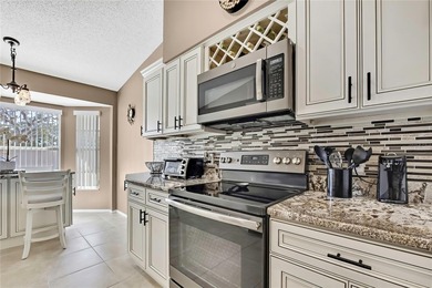 Villa in Timber Pines 55+ Community. Beautifully updated on Timber Pines Golf Course in Florida - for sale on GolfHomes.com, golf home, golf lot