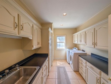 Welcome to Hollytree living in this 4BR 3BA estate spanning on Hollytree Country Club in Texas - for sale on GolfHomes.com, golf home, golf lot