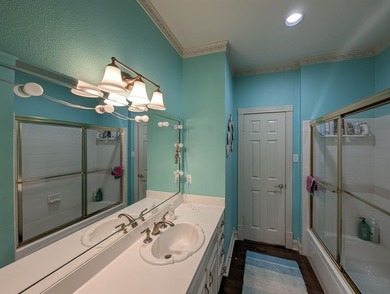 Welcome to Hollytree living in this 4BR 3BA estate spanning on Hollytree Country Club in Texas - for sale on GolfHomes.com, golf home, golf lot