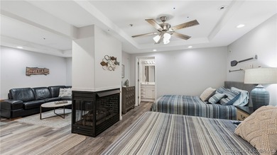 Enjoy incredible lake views from this spacious 4-bedroom, 3-bath on Tan-Tar-A Golf Club in Missouri - for sale on GolfHomes.com, golf home, golf lot