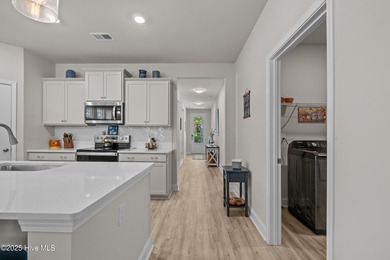 Experience Coastal Living at Its Best in Brunswick Plantation! on Brunswick Plantation and Golf Resorts in North Carolina - for sale on GolfHomes.com, golf home, golf lot