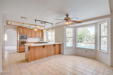 Welcome to this 4-bedroom, 3-bath home located on a quiet on Boulder City Municipal Golf Course in Nevada - for sale on GolfHomes.com, golf home, golf lot