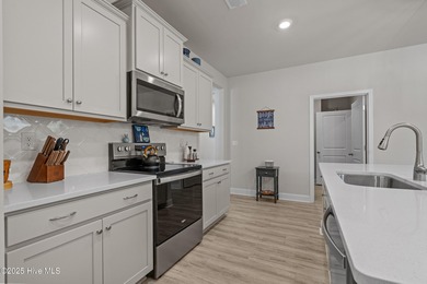 Experience Coastal Living at Its Best in Brunswick Plantation! on Brunswick Plantation and Golf Resorts in North Carolina - for sale on GolfHomes.com, golf home, golf lot