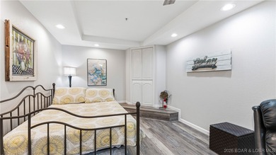 Enjoy incredible lake views from this spacious 4-bedroom, 3-bath on Tan-Tar-A Golf Club in Missouri - for sale on GolfHomes.com, golf home, golf lot