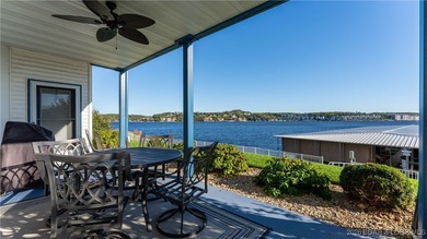 Enjoy incredible lake views from this spacious 4-bedroom, 3-bath on Tan-Tar-A Golf Club in Missouri - for sale on GolfHomes.com, golf home, golf lot