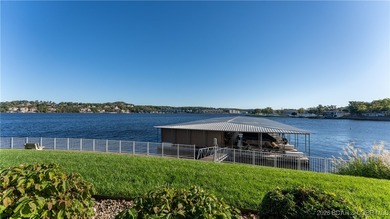 Enjoy incredible lake views from this spacious 4-bedroom, 3-bath on Tan-Tar-A Golf Club in Missouri - for sale on GolfHomes.com, golf home, golf lot