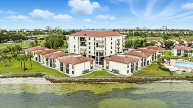 Live the Florida dream in this beautiful waterfront condo on on Isla Del Sol Yacht and Country Club in Florida - for sale on GolfHomes.com, golf home, golf lot