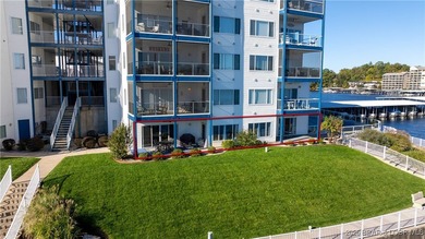 Enjoy incredible lake views from this spacious 4-bedroom, 3-bath on Tan-Tar-A Golf Club in Missouri - for sale on GolfHomes.com, golf home, golf lot