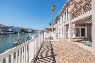 Ultimate coastal retreat at this stunning canal-front home in on Palmilla Beach Golf Club in Texas - for sale on GolfHomes.com, golf home, golf lot