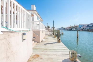 Ultimate coastal retreat at this stunning canal-front home in on Palmilla Beach Golf Club in Texas - for sale on GolfHomes.com, golf home, golf lot