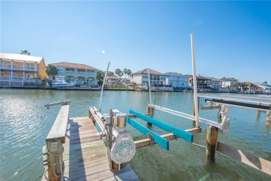 Ultimate coastal retreat at this stunning canal-front home in on Palmilla Beach Golf Club in Texas - for sale on GolfHomes.com, golf home, golf lot