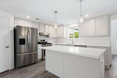 Set high in the scenic La Quinta Cove, this tastefully remodeled on Tradition Golf Club in California - for sale on GolfHomes.com, golf home, golf lot