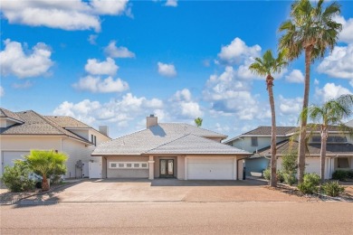 Ultimate coastal retreat at this stunning canal-front home in on Palmilla Beach Golf Club in Texas - for sale on GolfHomes.com, golf home, golf lot