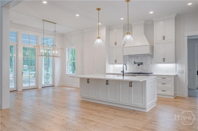 This beautiful and professionally appointed low-country cottage on The Ford Field and River Club  in Georgia - for sale on GolfHomes.com, golf home, golf lot