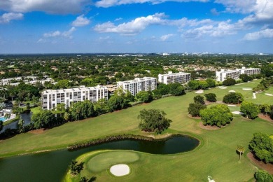 Beautifully renovated home with an amazing lake and golf view in on  in Florida - for sale on GolfHomes.com, golf home, golf lot