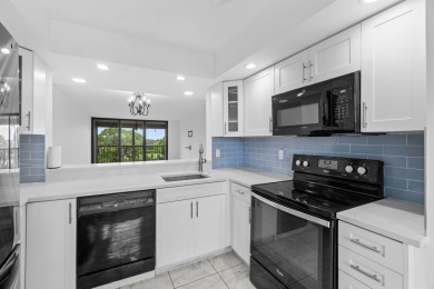 Beautifully renovated home with an amazing lake and golf view in on  in Florida - for sale on GolfHomes.com, golf home, golf lot