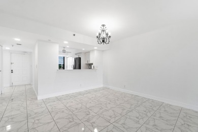 Beautifully renovated home with an amazing lake and golf view in on  in Florida - for sale on GolfHomes.com, golf home, golf lot