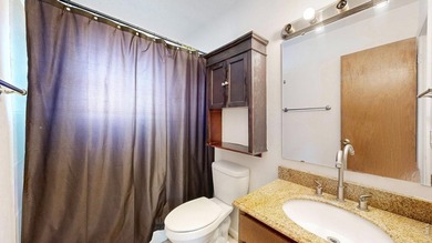 Wake up to mountain views and fresh alpine air in this 2-bedroom on Lake Estes Golf Course in Colorado - for sale on GolfHomes.com, golf home, golf lot