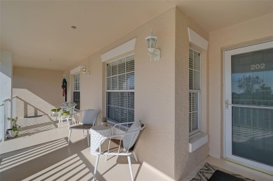 Discover this STUNNING 2-bedroom, 2-bathroom Second-floor condo on Peridia Golf and Country Club in Florida - for sale on GolfHomes.com, golf home, golf lot