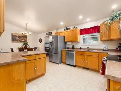 Welcome to 228 S Golfwood Dr W! This immaculate ranch-style home on Desert Hawk At Pueblo West in Colorado - for sale on GolfHomes.com, golf home, golf lot
