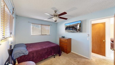Wake up to mountain views and fresh alpine air in this 2-bedroom on Lake Estes Golf Course in Colorado - for sale on GolfHomes.com, golf home, golf lot
