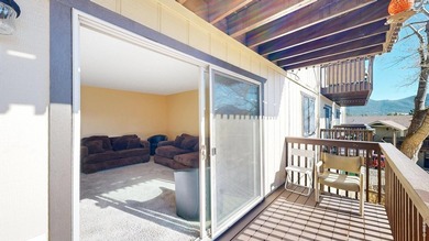 Wake up to mountain views and fresh alpine air in this 2-bedroom on Lake Estes Golf Course in Colorado - for sale on GolfHomes.com, golf home, golf lot