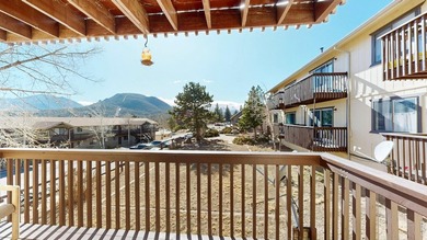 Wake up to mountain views and fresh alpine air in this 2-bedroom on Lake Estes Golf Course in Colorado - for sale on GolfHomes.com, golf home, golf lot