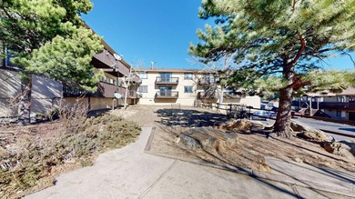 Wake up to mountain views and fresh alpine air in this 2-bedroom on Lake Estes Golf Course in Colorado - for sale on GolfHomes.com, golf home, golf lot