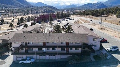 Wake up to mountain views and fresh alpine air in this 2-bedroom on Lake Estes Golf Course in Colorado - for sale on GolfHomes.com, golf home, golf lot