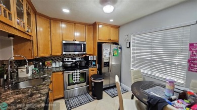 Totally updated this Townhome is ready for its new owner. Impact on Pembroke Lakes Golf Club in Florida - for sale on GolfHomes.com, golf home, golf lot