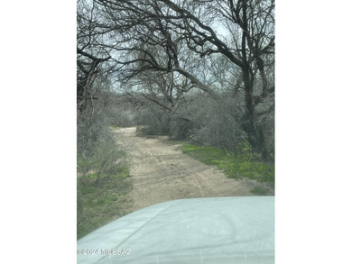 This property backs up against government land at the base of on Tubac Golf Resort and Spa in Arizona - for sale on GolfHomes.com, golf home, golf lot