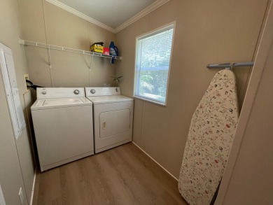 Listed by the Official Sales Team of Cypress Lakes Village on Big Cypress Golf and Country Club in Florida - for sale on GolfHomes.com, golf home, golf lot