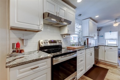 Welcome home to this beautifully updated three-bedroom, two-bath on Palm Hill Golf Club in Florida - for sale on GolfHomes.com, golf home, golf lot