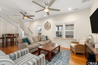 This turnkey 5-bedroom, 3.5-bath home in Ocean Lakes Section O on The Currituck Golf Club in North Carolina - for sale on GolfHomes.com, golf home, golf lot