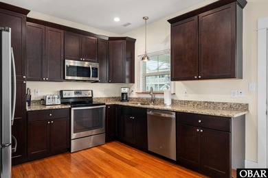 This turnkey 5-bedroom, 3.5-bath home in Ocean Lakes Section O on The Currituck Golf Club in North Carolina - for sale on GolfHomes.com, golf home, golf lot