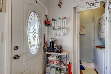 Welcome home to this beautifully updated three-bedroom, two-bath on Palm Hill Golf Club in Florida - for sale on GolfHomes.com, golf home, golf lot