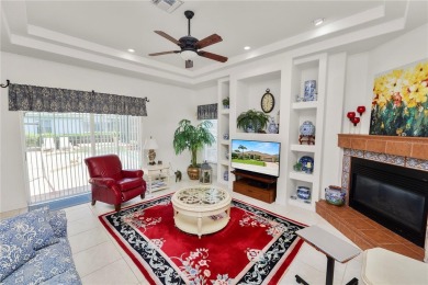 This is an immaculate 4 bedroom / 3 Bathroom one level Pool home on Grasslands Golf and Country Club in Florida - for sale on GolfHomes.com, golf home, golf lot