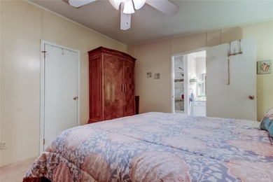 Welcome home to this beautifully updated three-bedroom, two-bath on Palm Hill Golf Club in Florida - for sale on GolfHomes.com, golf home, golf lot