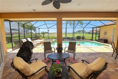 This is an immaculate 4 bedroom / 3 Bathroom one level Pool home on Grasslands Golf and Country Club in Florida - for sale on GolfHomes.com, golf home, golf lot