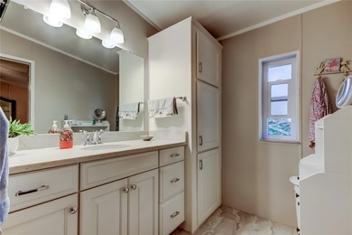 Welcome home to this beautifully updated three-bedroom, two-bath on Palm Hill Golf Club in Florida - for sale on GolfHomes.com, golf home, golf lot