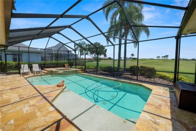 This is an immaculate 4 bedroom / 3 Bathroom one level Pool home on Grasslands Golf and Country Club in Florida - for sale on GolfHomes.com, golf home, golf lot